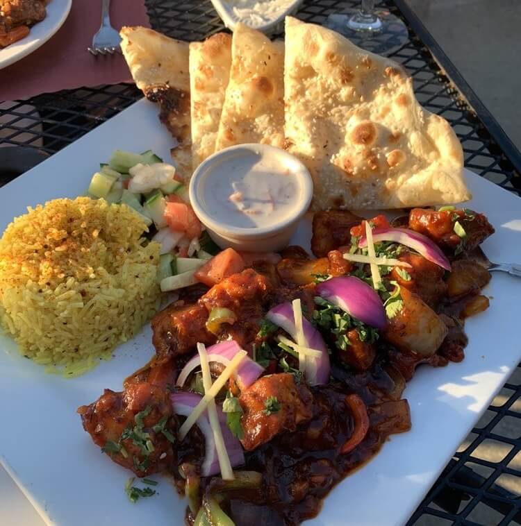 Lemon rice, sesame naan, and chicken from Kabab & Curry