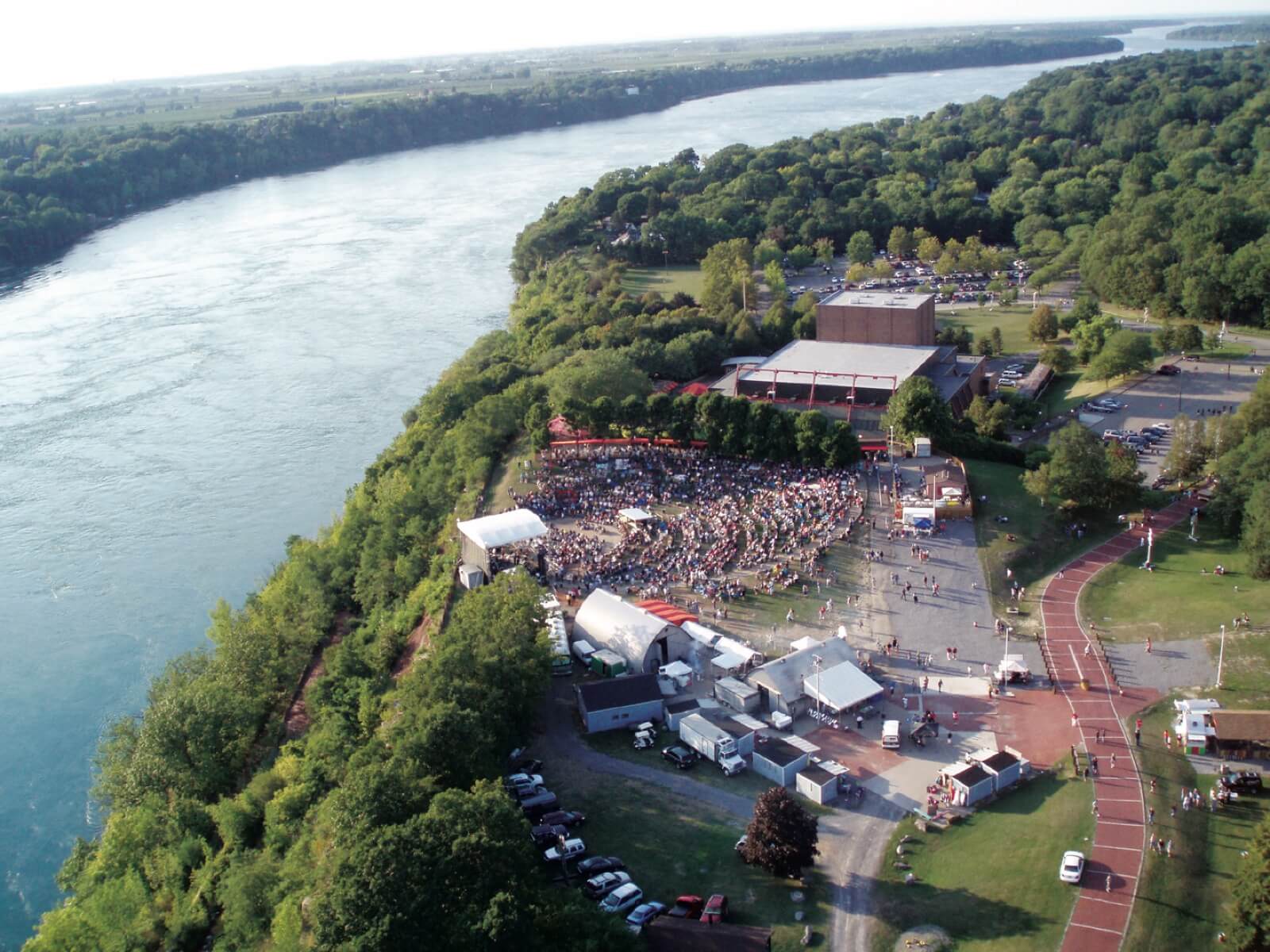 Aerial view of the Artpark amphitheater and a summer concert crowd on the Niagara River in Lewiston, New York